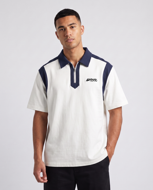 The Coconut Club zip polo — three-quarter angle